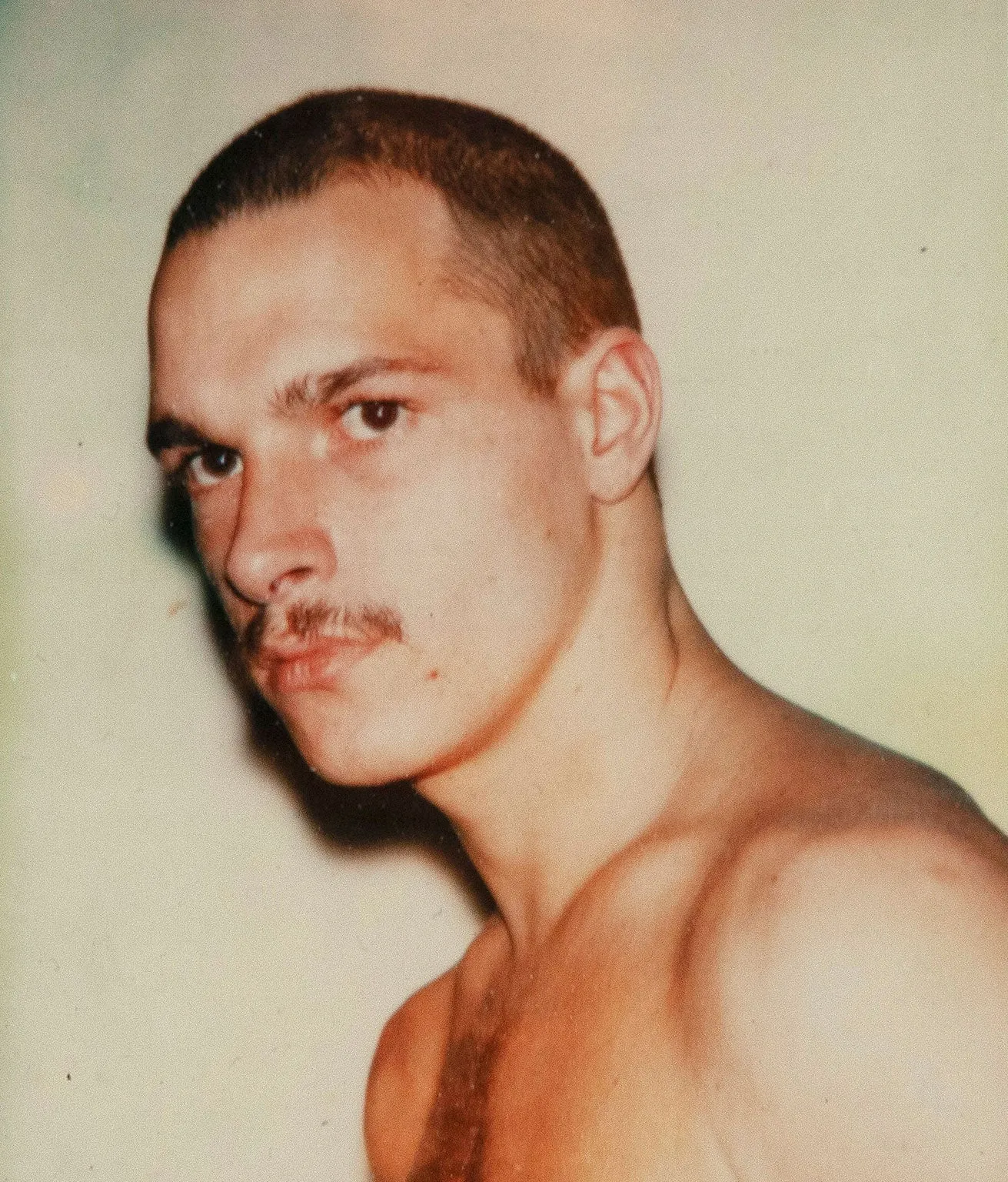 ANDY WARHOL "YOUNG MOUSTACHE" POLAROID, 1977