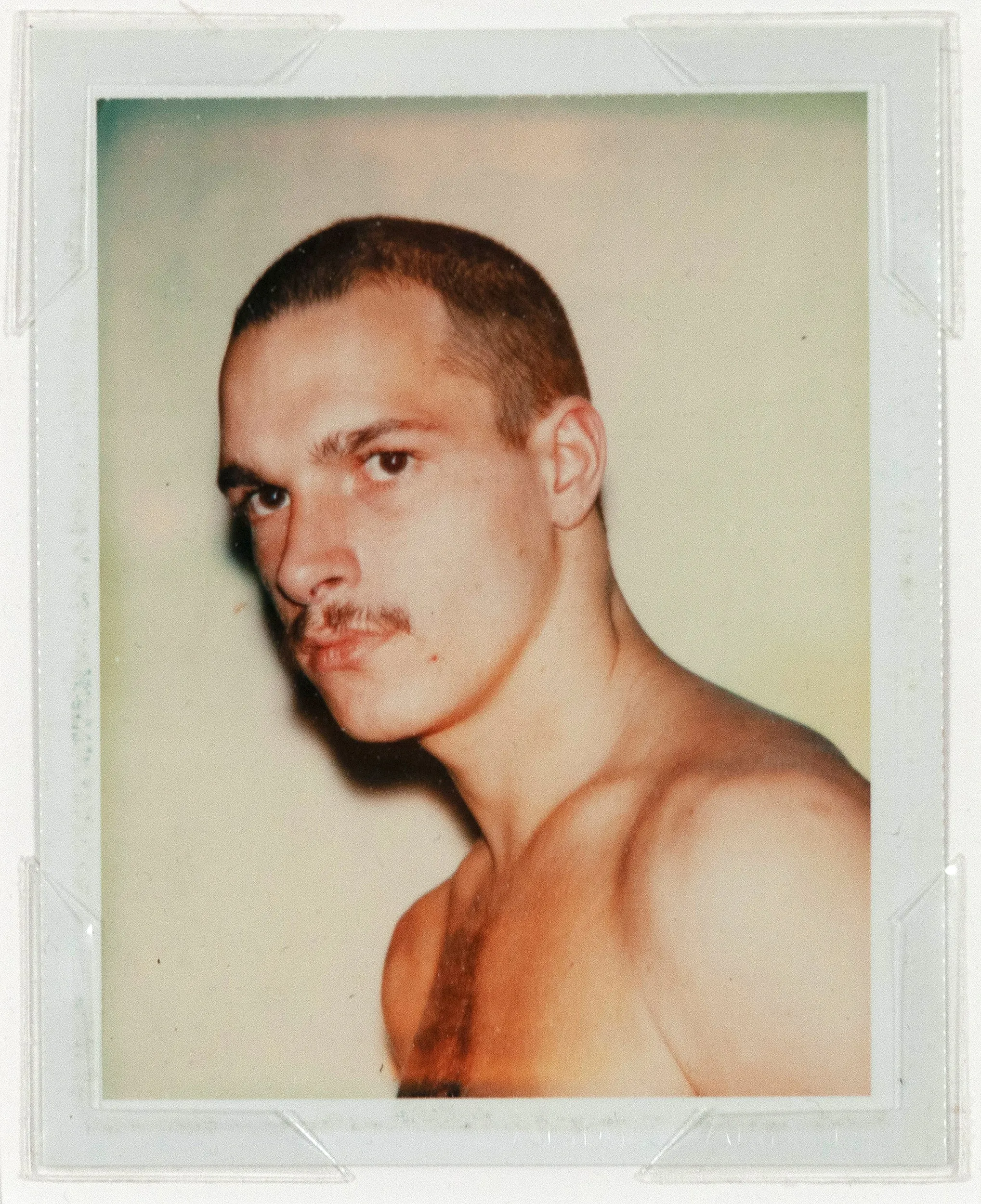 ANDY WARHOL "YOUNG MOUSTACHE" POLAROID, 1977